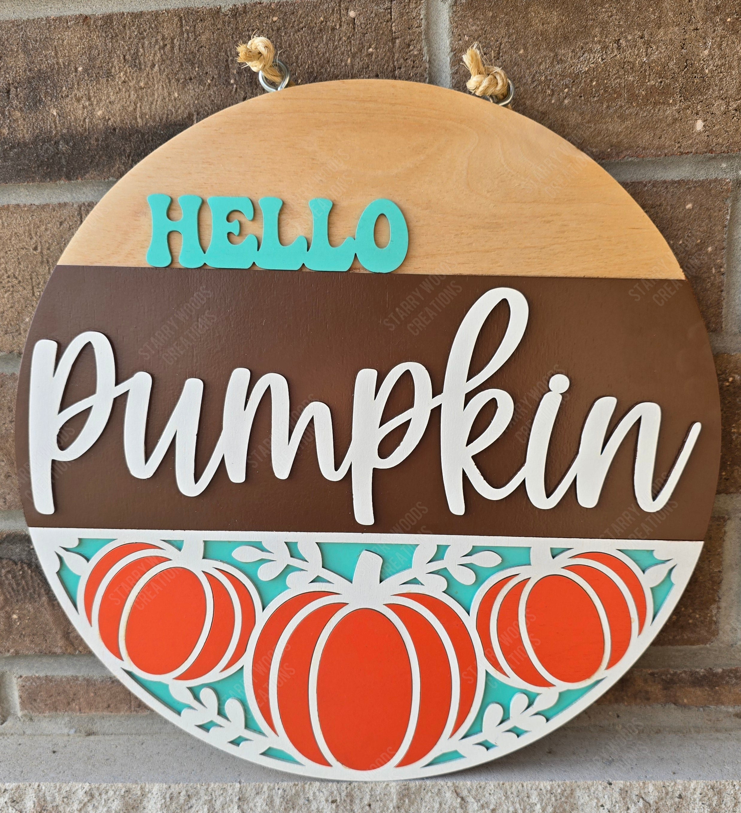 Decorative sign with 'Hello Pumpkin' text and pumpkin illustrations on a brick wall background. Handmade in Ontario and ready to hang.
