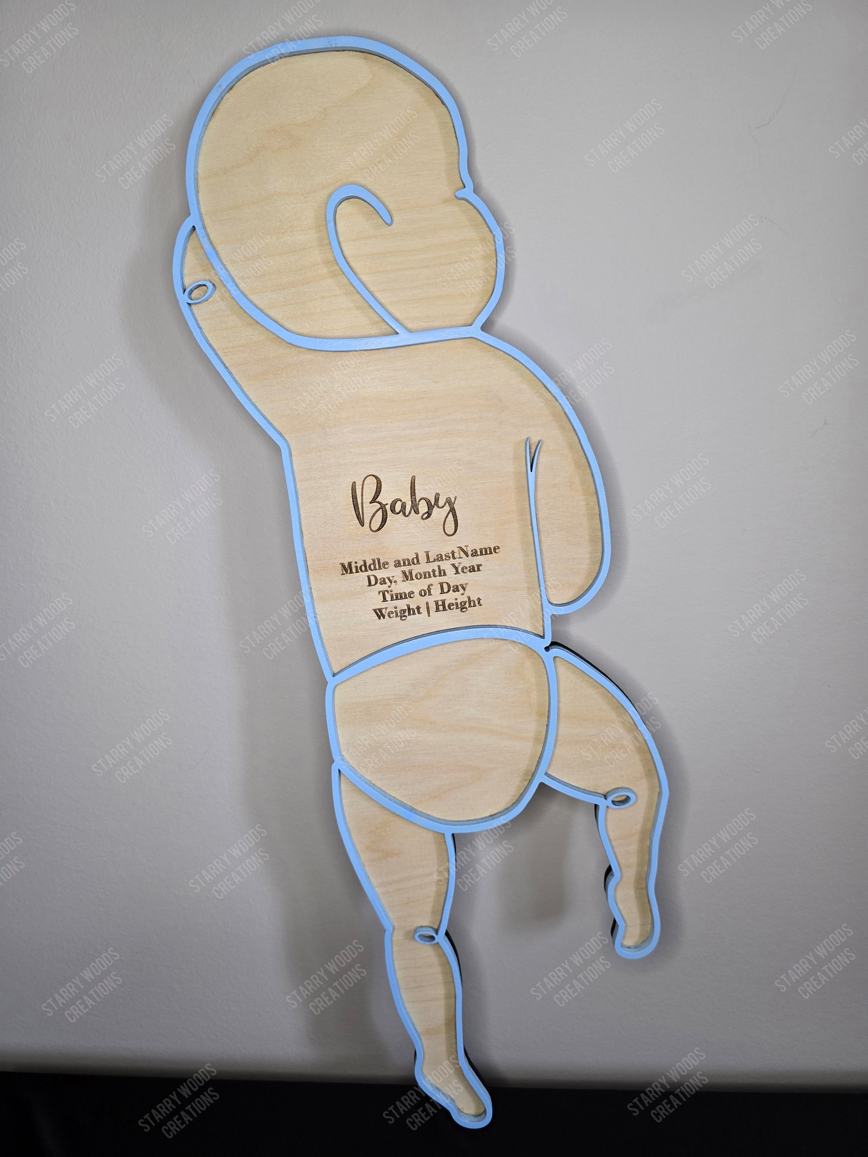 Wooden tummy lying baby silhouette with engraving space that can be cistomized with birth stats. Handmade in Ontario, perfect as a keepsake or for gifting.